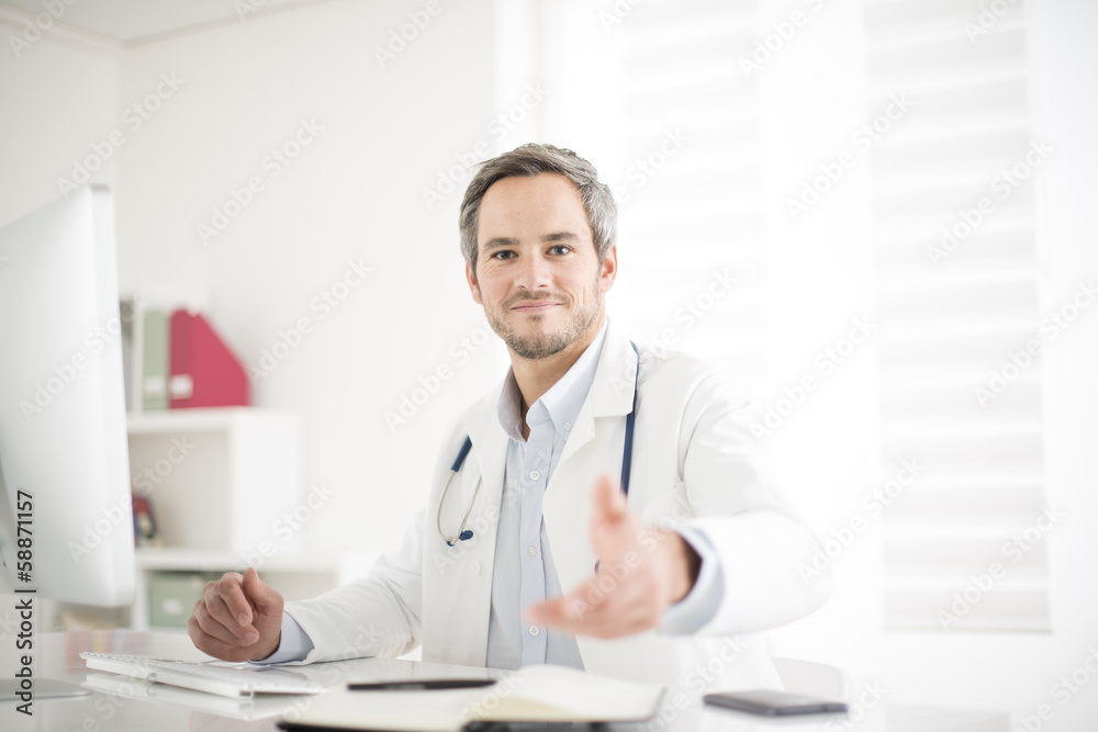 young doctor at his office young doctor at his office