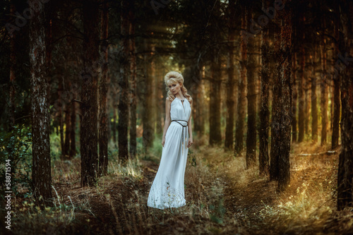 Portrait of romantic woman in forest