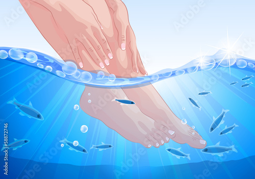 Female feet and hands, fish spa treatment