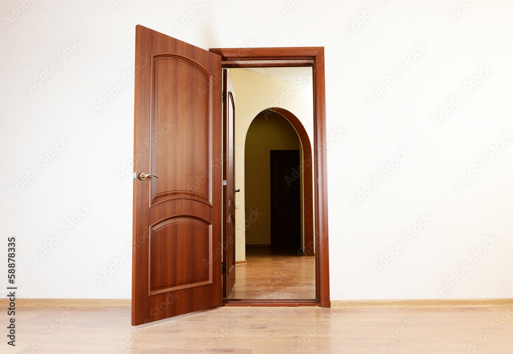 Open door in empty room Open door in empty room