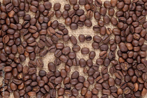 Coffee beans in a sacking background