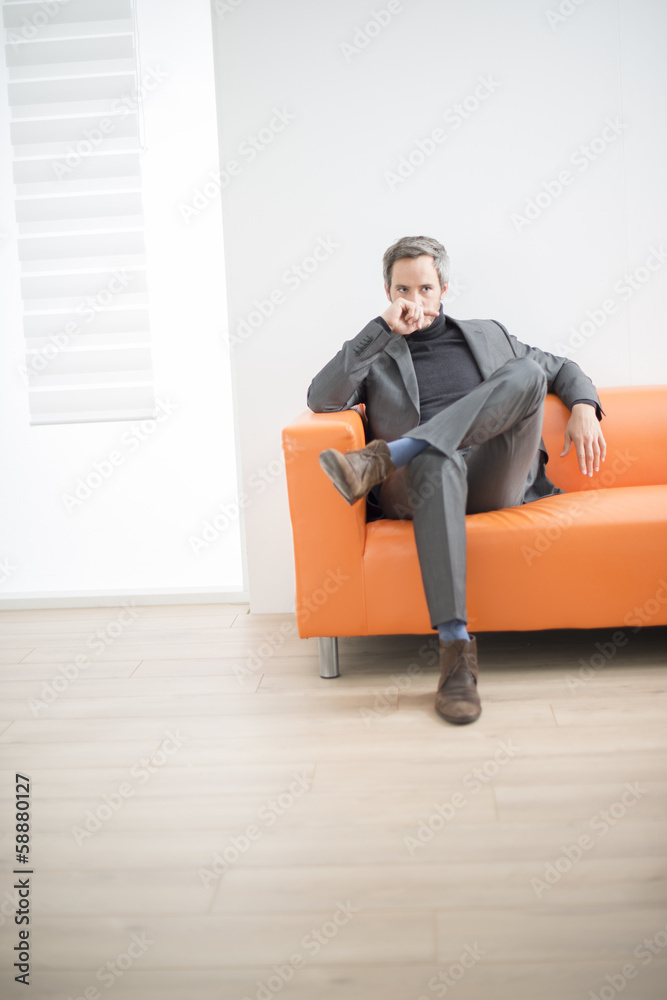 man in a waiting room man in a waiting room