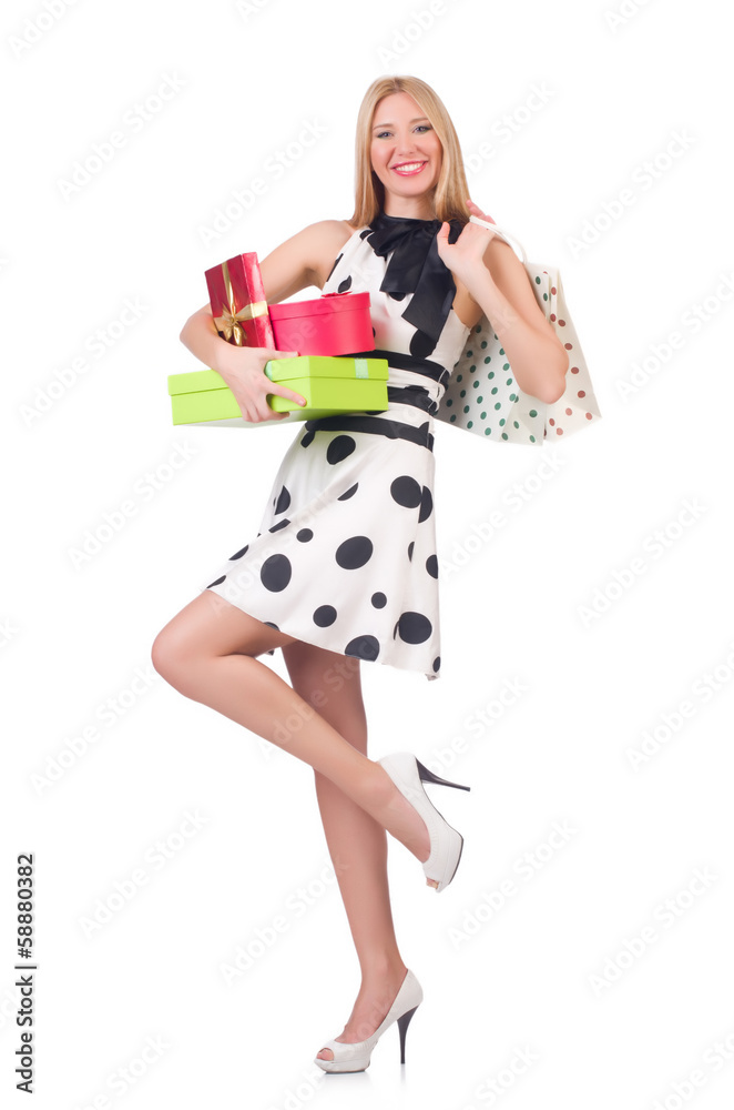 Young woman with christmas shopping on white Young woman with christmas shopping on white