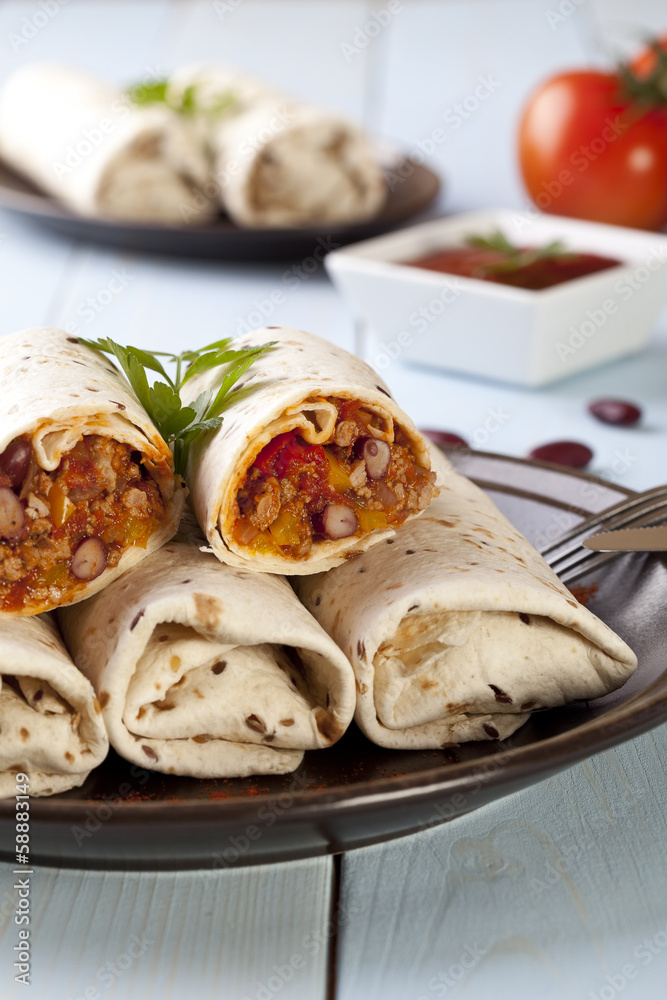 burritos wraps with meat beans and vegetables