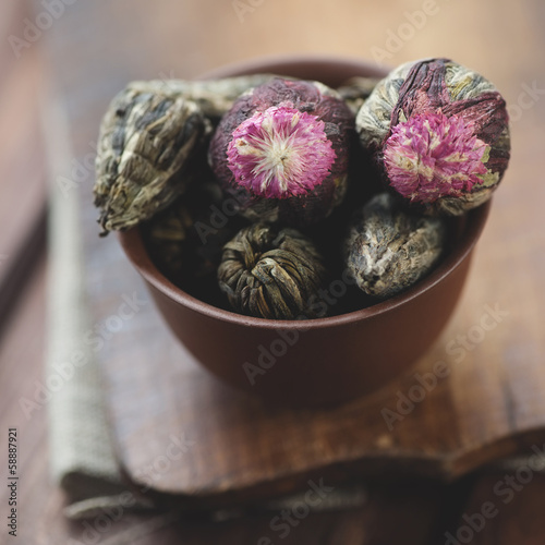 Ceramic pialat with compressed herbal tea, close-up photo