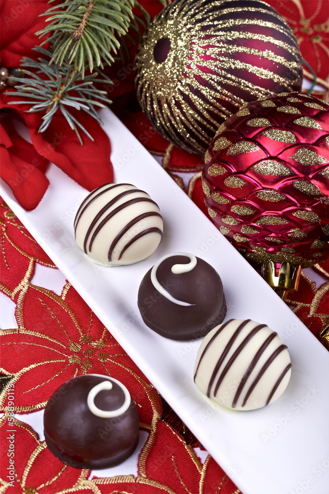 Group of chocolate pralines and Christmas decoration Group of chocolate pralines and Christmas decoration
