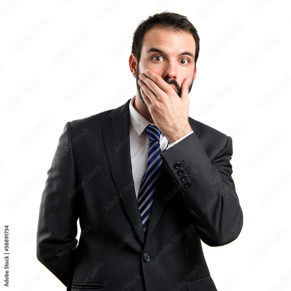 Businessman surprised over white background Businessman surprised over white background