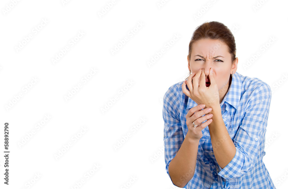 Woman covers her nose, can't breath, something stinks Woman covers her nose, can't breath, something stinks