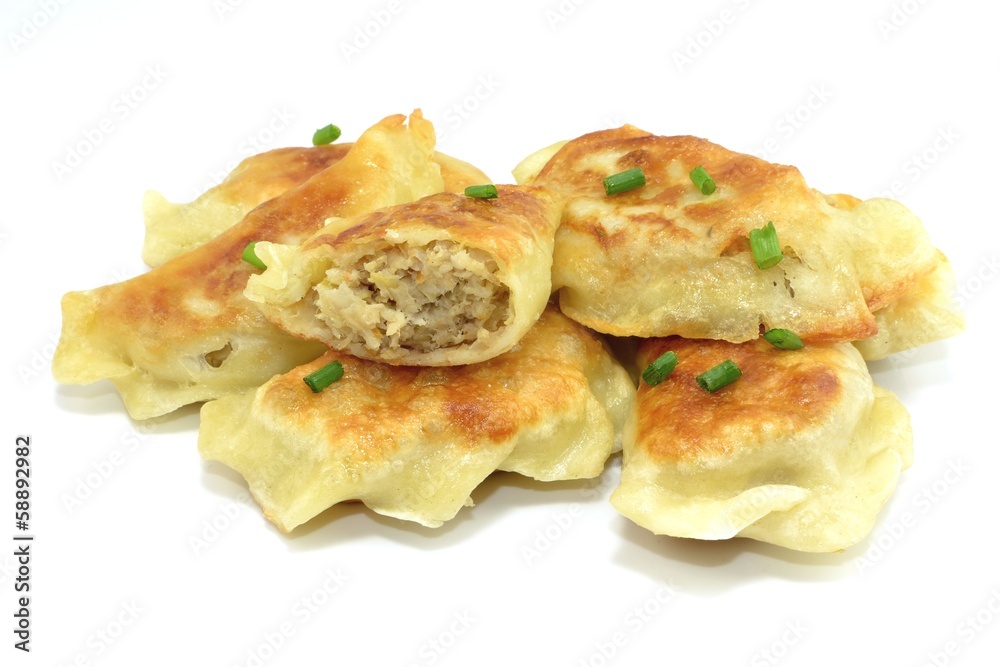 fried dumplings filled with meat and cabbage fried dumplings filled with meat and cabbage