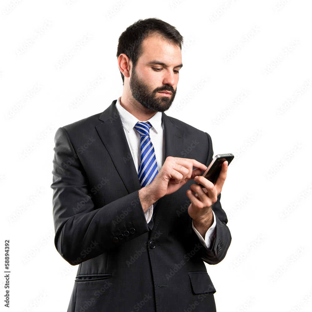 Business man sending a message over isolated background. Business man sending a message over isolated background.