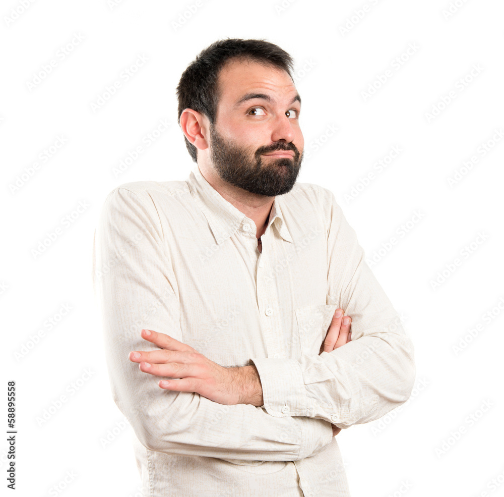 Young man satisfied over white background Young man satisfied over white background