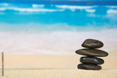 Pebbles on the sandy coast