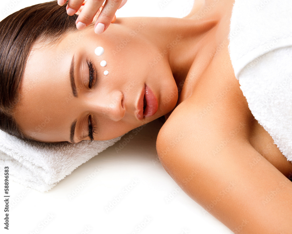 Close-up of a Young Woman Getting Spa Treatment. Cosmetic Cream Close-up of a Young Woman Getting Spa Treatment. Cosmetic Cream