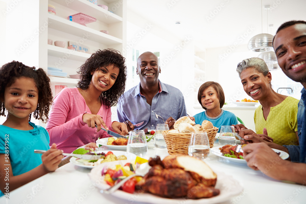 Multi Generation African American Family Eating Meal At Home Multi Generation African American Family Eating Meal At Home