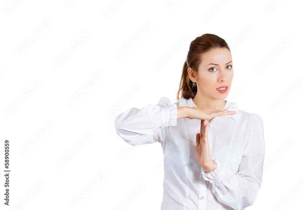 Serious woman showing time out sign gesture Serious woman showing time out sign gesture