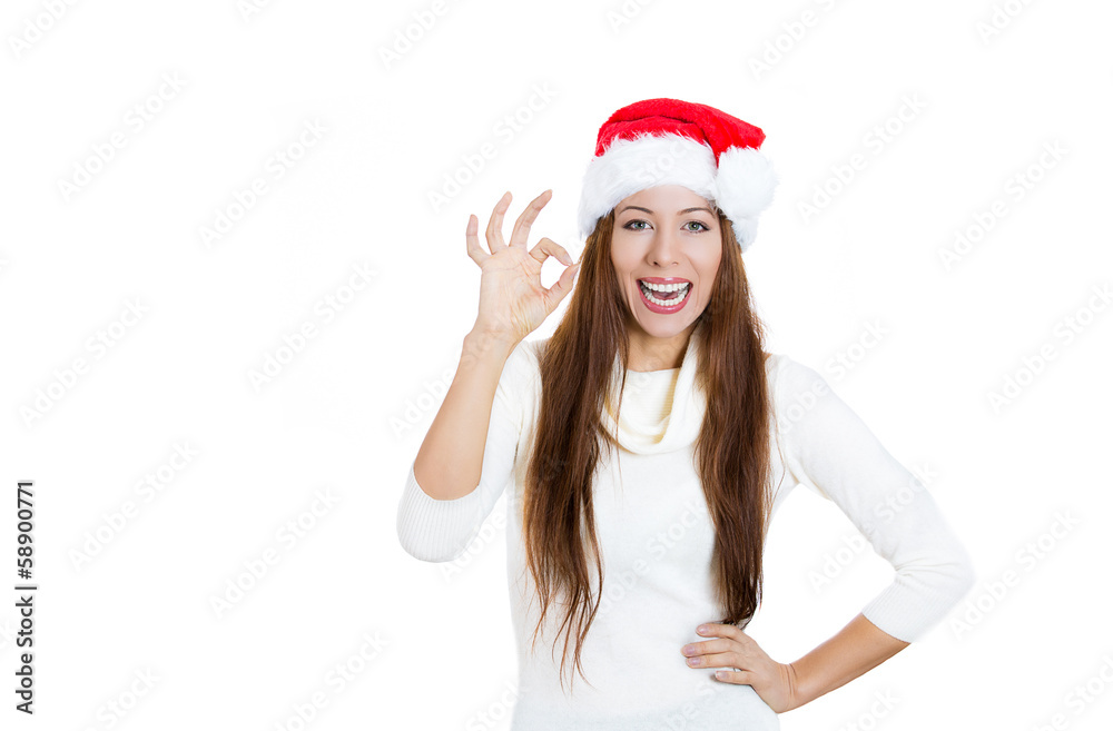 Happy christmas woman showing ok sign Happy christmas woman showing ok sign