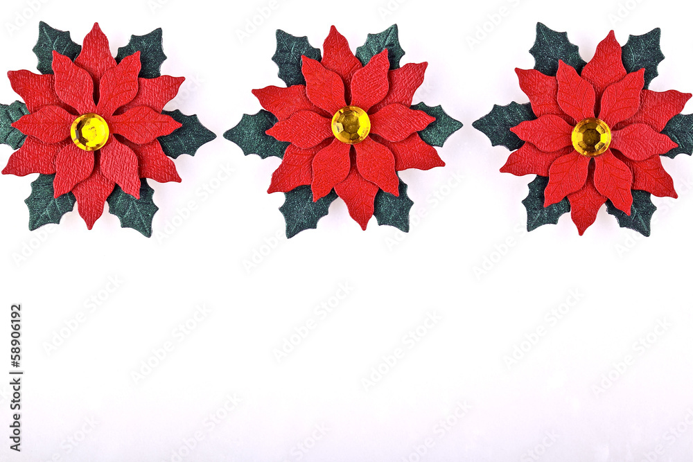 Christmas card or invitation,red flowers on ceramic background Christmas card or invitation,red flowers on ceramic background