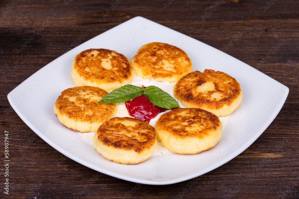 Delicious homemade cheese pancakes closeup Delicious homemade cheese pancakes closeup
