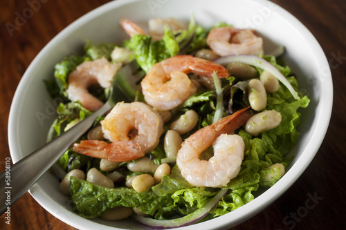 simple shrimp salad on greens with green dressing