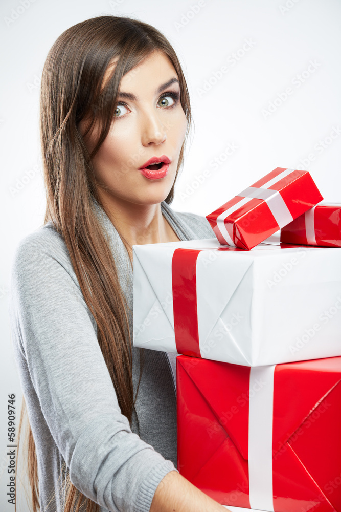 Young woman portrait hold many gift in christmas color style . Young woman portrait hold many gift in christmas color style .