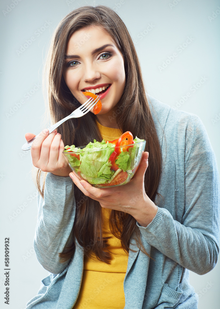 Woman diet concept portrait. Female model hold green salad. Woman diet concept portrait. Female model hold green salad.