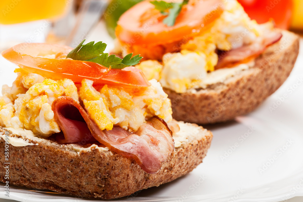 Sandwich with scrambled eggs and bacon Sandwich with scrambled eggs and bacon