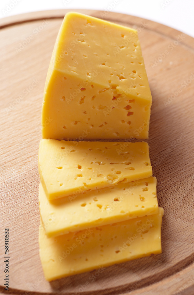 Block of cheese cut into slices