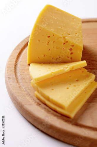 Block of cheese cut into slices