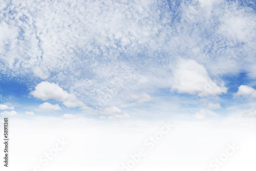 White fluffy clouds sky background