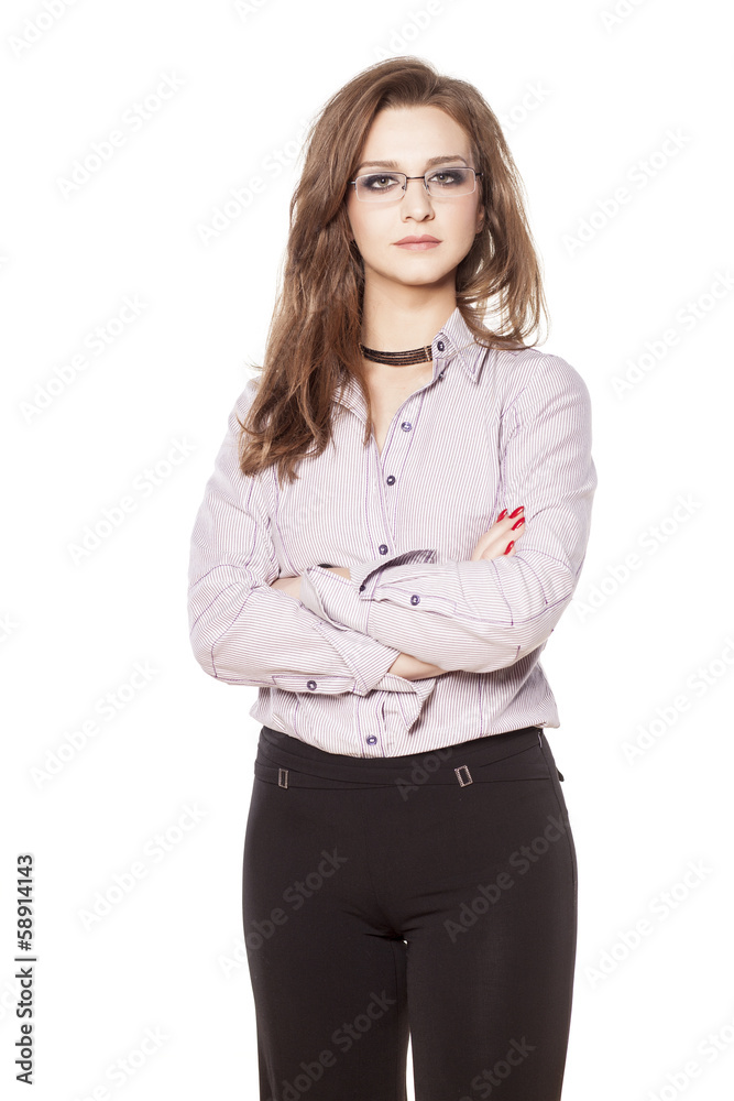 young serious business woman posing with crossed arms young serious business woman posing with crossed arms