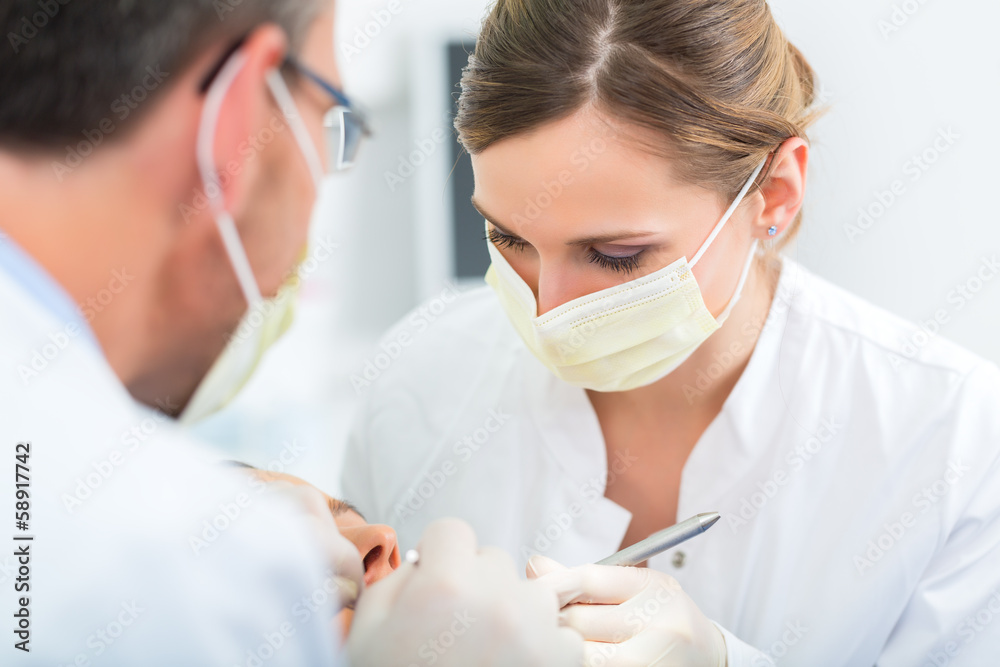 Patient with Dentist - dental treatment