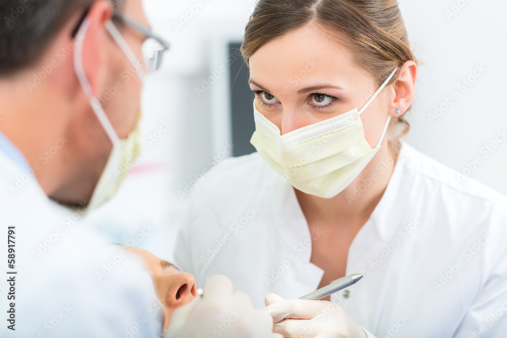 Patient with Dentist - dental treatment Patient with Dentist - dental treatment