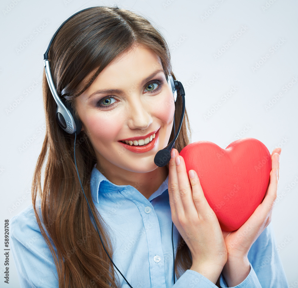 Woman call center operator hold love symbol Red heart. Close up Woman call center operator hold love symbol Red heart. Close up