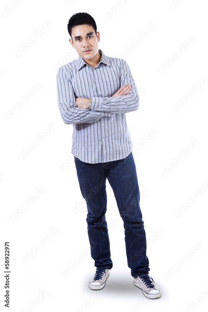 Naklejka premium Handsome man with arms folded