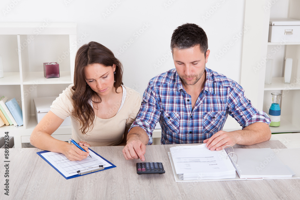 Couple Calculating Bills Couple Calculating Bills