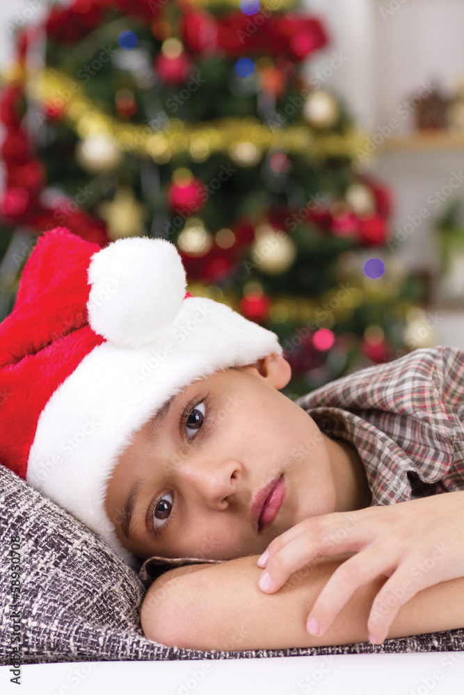 unhappy boy on Christmas Eve unhappy boy on Christmas Eve