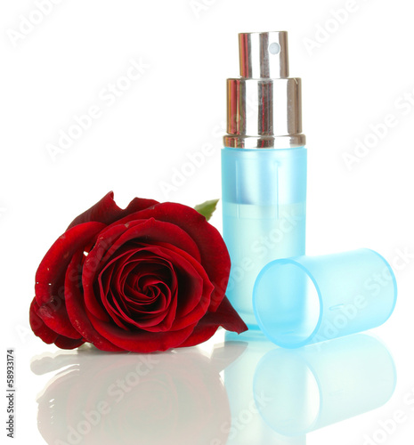Women's perfume in beautiful bottle with rose isolated on white