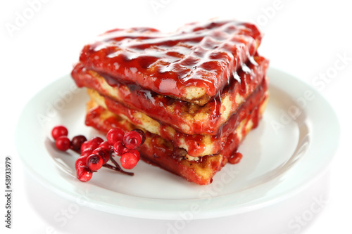 Sweet Belgium waffles with jam, isolated on white