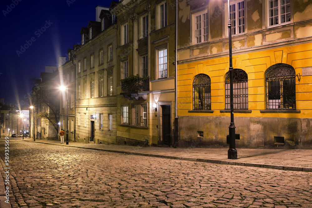 Cobbled Mostowa Street in Warsaw at Night