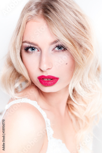 glamor portrait of beautiful sexy blonde with red lips