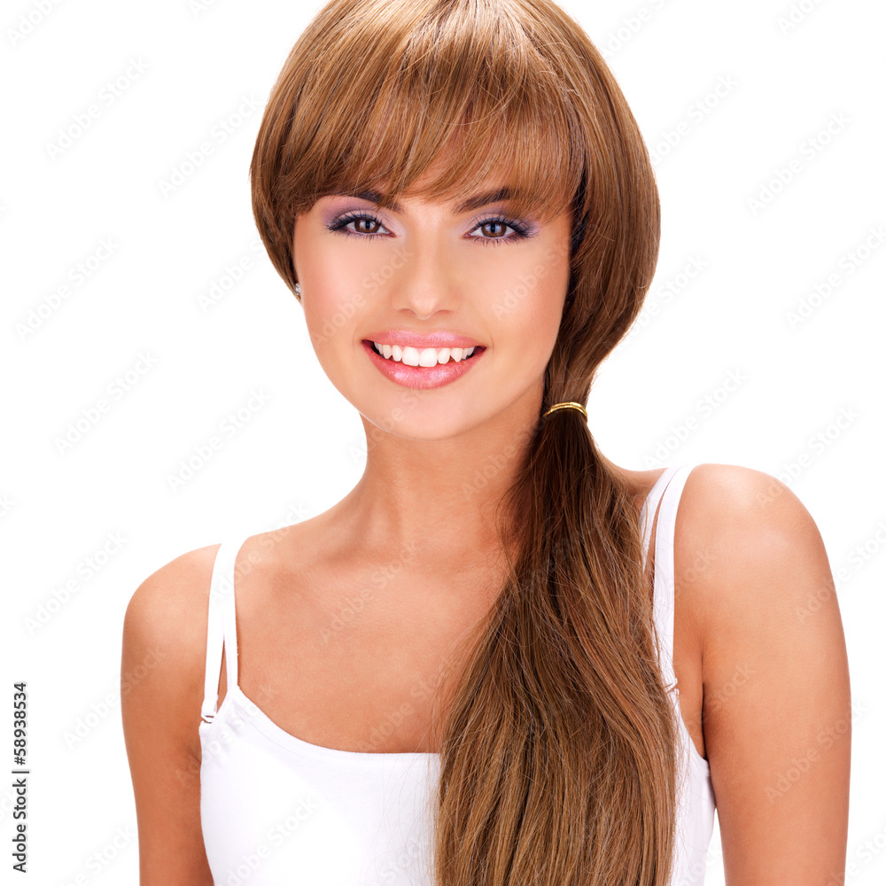 Face of a smiling beautiful indian woman with long hair Face of a smiling beautiful indian woman with long hair