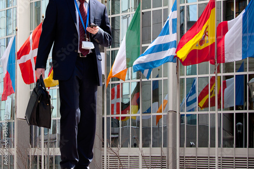 Functionary calling on the phone. Flags.