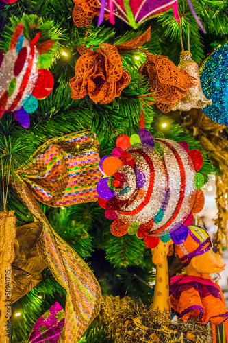 Colorful Christmas tree ornaments and decorations. © 9'63 Creation