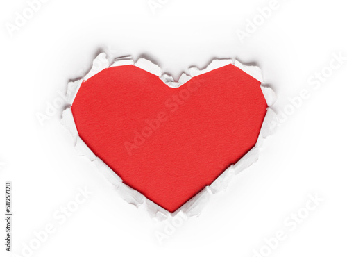 Ripped heart shaped red paper, isolated on white