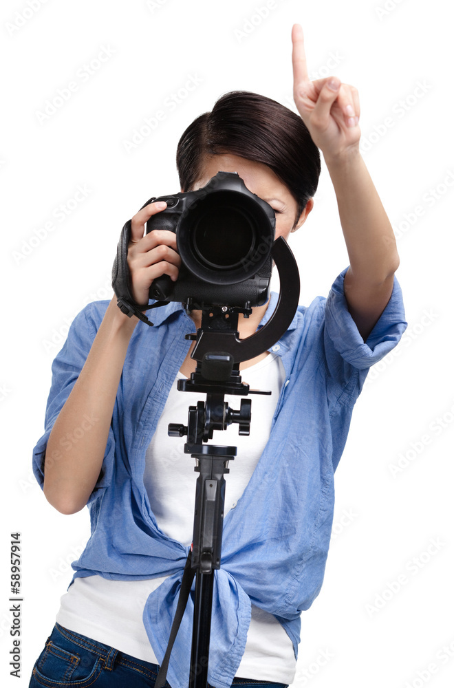 Girl takes pictures holding photographic camera, isolated Girl takes pictures holding photographic camera, isolated