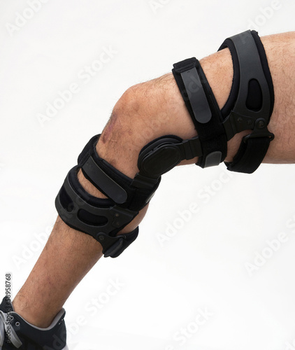 Obraz na plátně Knee brace for knee injury.