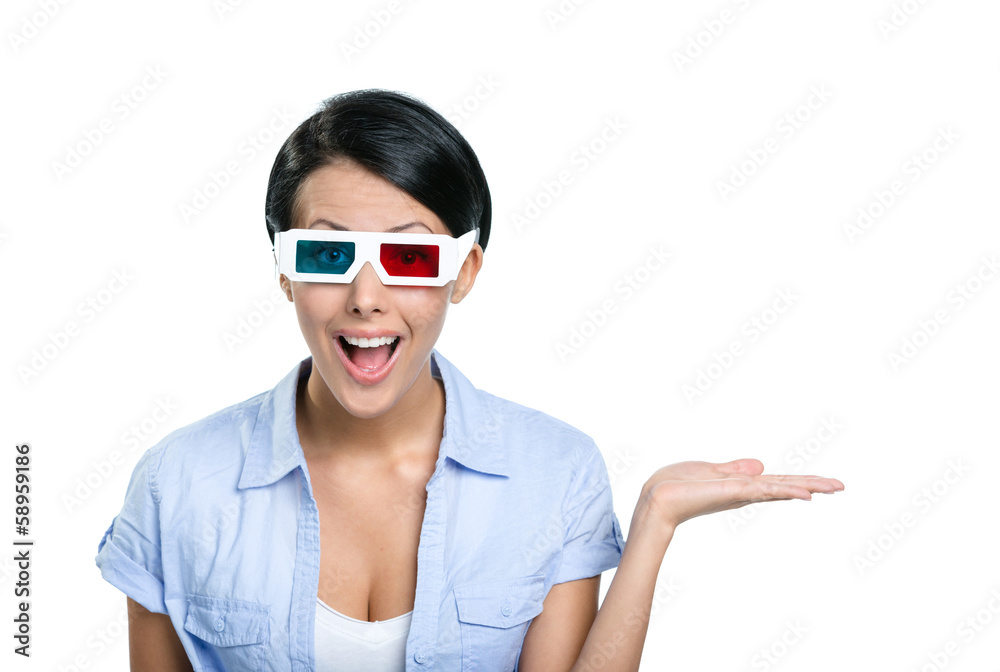 Girl watches the movie in 3D glasses with the palm up Girl watches the movie in 3D glasses with the palm up