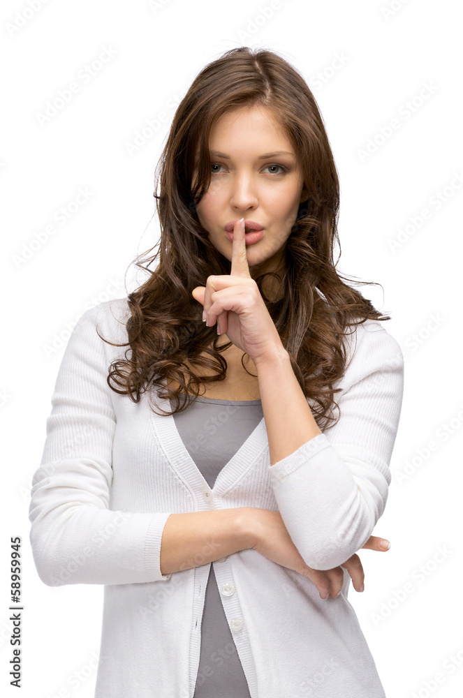Portrait of woman silence gesturing, isolated on white Portrait of woman silence gesturing, isolated on white