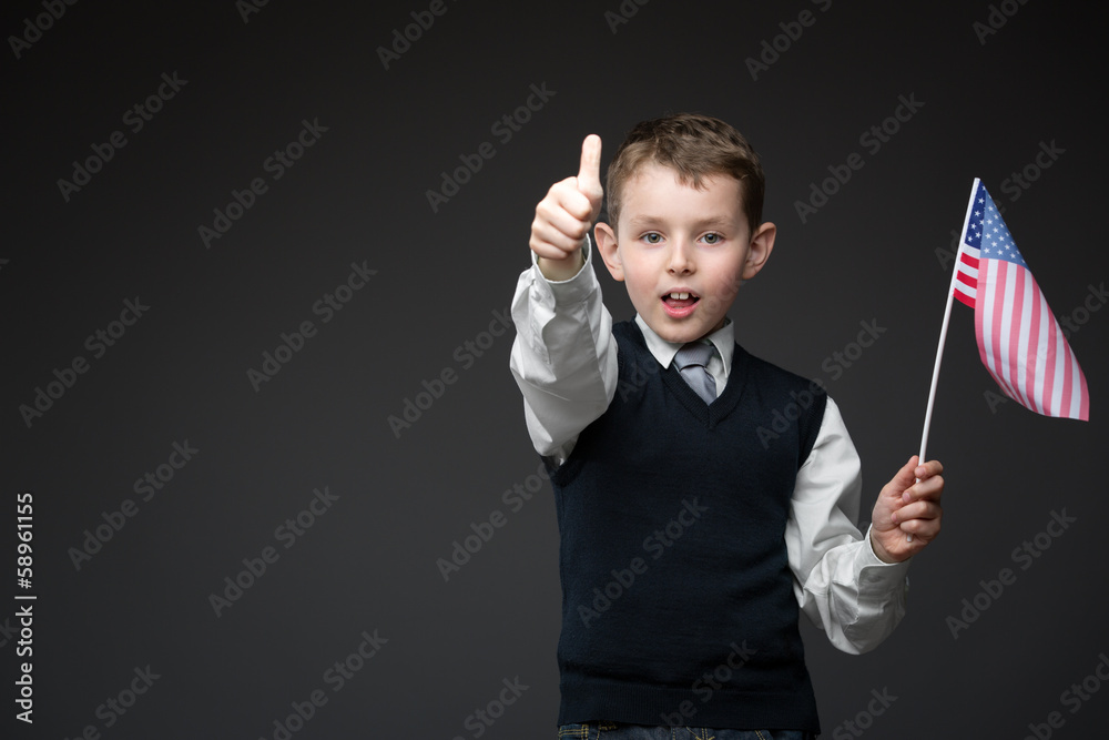 Portrait of thumbing up boy with American flag Portrait of thumbing up boy with American flag