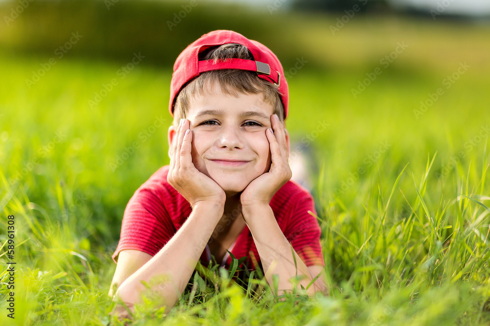 Portrait of a happy little boy in the park Portrait of a happy little boy in the park